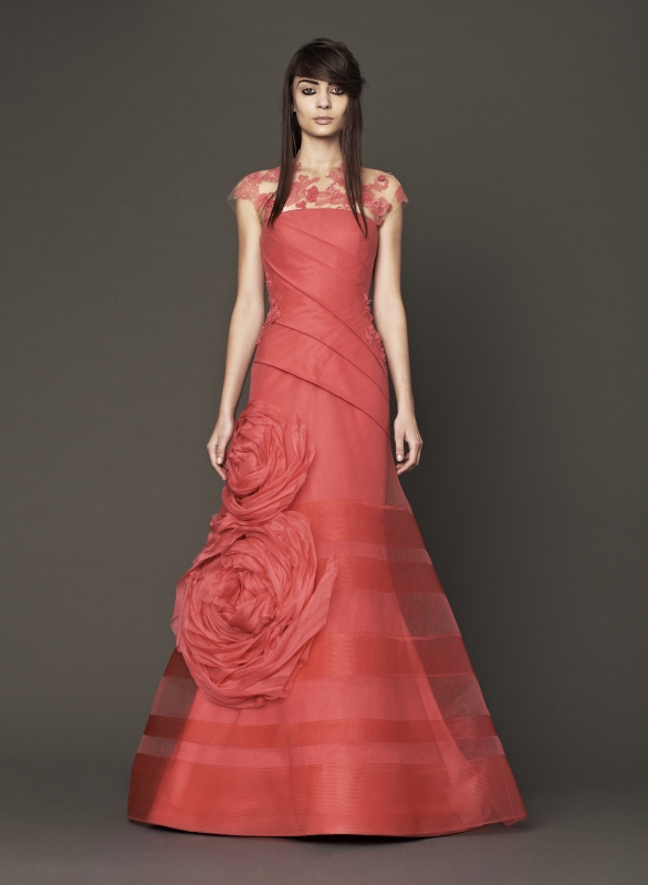 Vera Wang - Fall 2014 Bridal Collection - Wedding Dress Look 10
<br><br>
Coral strapless hand pleated silk faille and honeycomb tulle mermaid gown with horsehair ribbons, organic flower detail and floral beaded embroidery. Coral underlay with hand applique Chantilly lace and floral beaded embroidery.

<br><br>